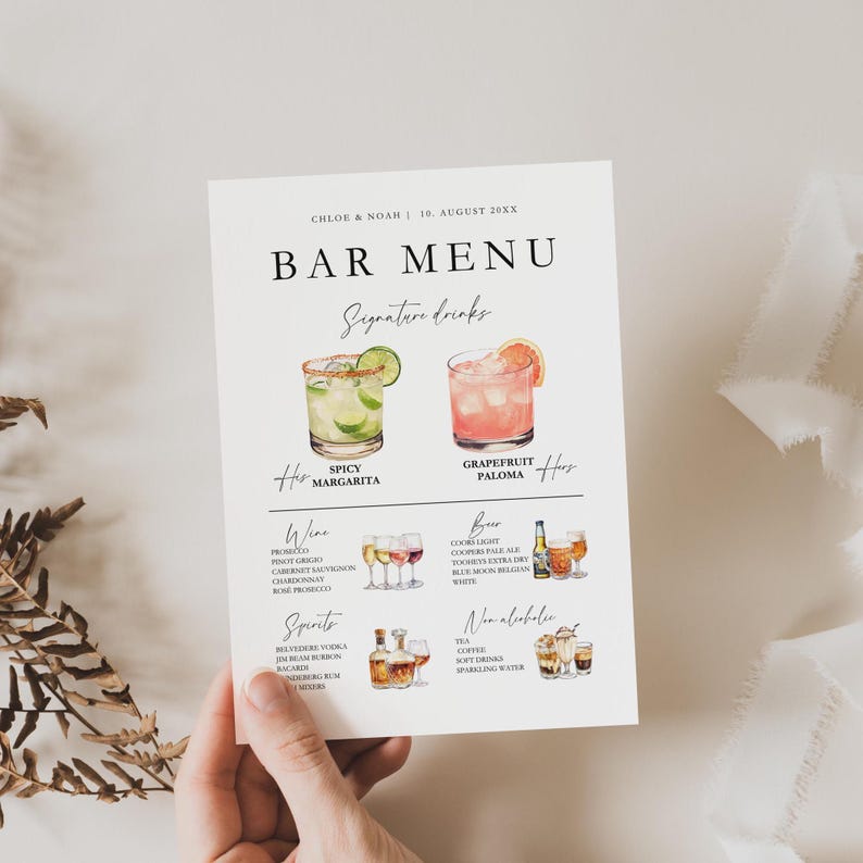 May include: A bar menu with a watercolor illustration of a spicy margarita and a grapefruit paloma. The menu lists wine, beer, spirits, and non-alcoholic options.