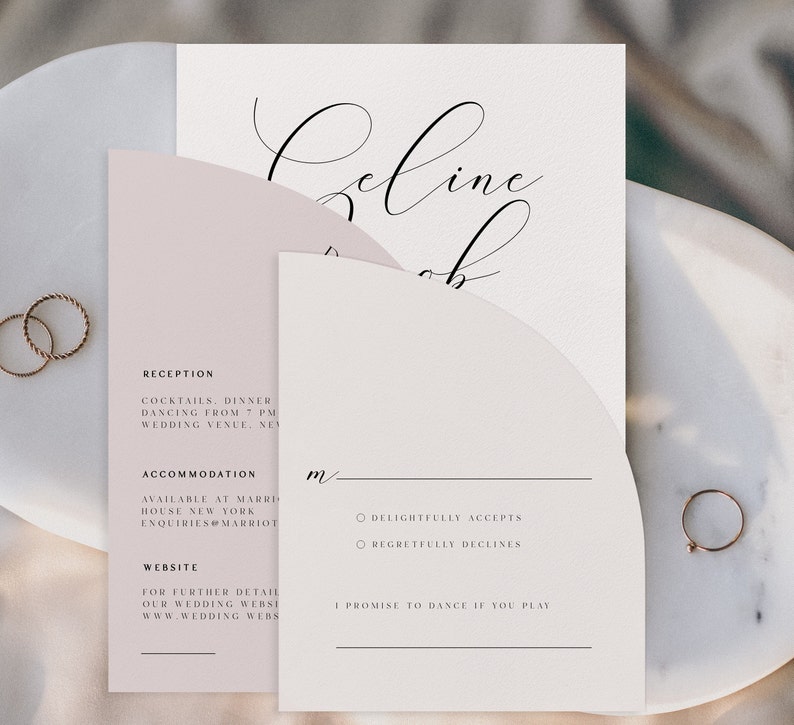 May include: A wedding invitation with a blush pink background and a white card with the text "Reception" and "Accommodation" in black. The text "Cocktails, Dinner, Dancing from 7 PM, Wedding Venue, New York" is listed under "Reception". The text "Available at Marriott House New York, Enquiries@Marriott" is listed under "Accommodation". The text "Website, For further details of our wedding website, www.wedding website" is listed under "Website". The white card also has a black line and the text "m/" written in black. The white card has two circles with the text "Delightfully Accepts" and "Regretfully Declines" written in black. The white card also has a black line and the text "I promise to dance if you play" written in black.