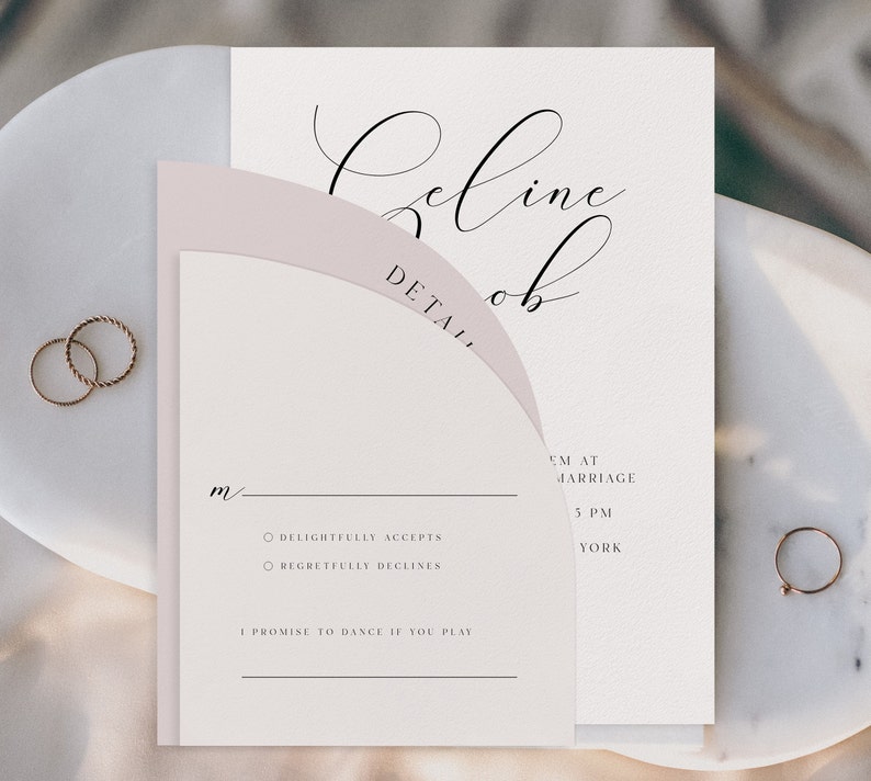 May include: A wedding RSVP card with a pink and white design. The card has a handwritten name at the top, "Celine Rob", and the word "DETAIL" in all caps. The card has two options for the guest to choose from: "Delightfully Accepts" or "Regretfully Declines". The card also includes the wedding details: "5 PM at Marriage York".