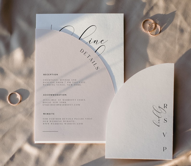 May include: A wedding invitation suite with a modern design. The invitation card is cream with a rounded edge and features the text "Line Details" in black calligraphy. The reception card is a light pink with a rounded edge and includes details about the reception, accommodation, and website. The RSVP card is a light pink with a rounded edge and features the text "RSVP" in black calligraphy.