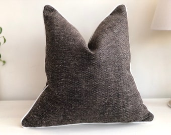 Textured Dark Grey/black cushion cover with white trim. Cushions with piped edge. Luxury home decor