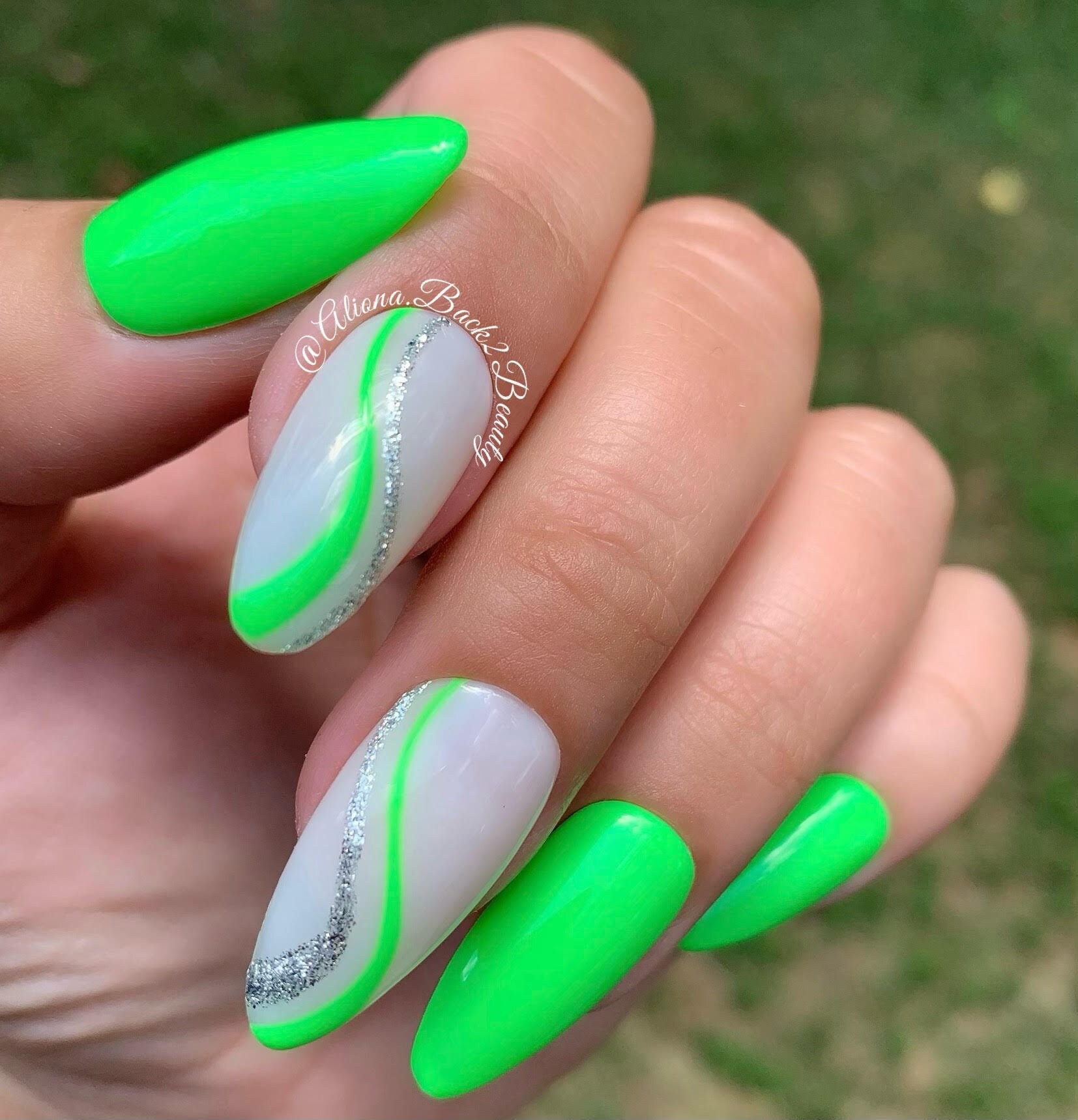 Playful Lop‑Sided Green Stencil Nail Design