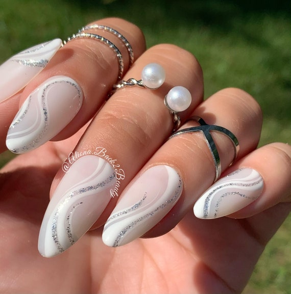 Beautiful Almond Long White Nails with Gemstone  White and silver nails, Silver  nails, Silver acrylic nails