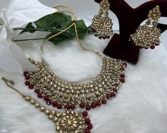 Beautiful Gold Toned Bollywood Style Kundan Polki Bridal Necklace set with Tikka. Indian & pakistani jewelry. Purple, multi, pink, gold.