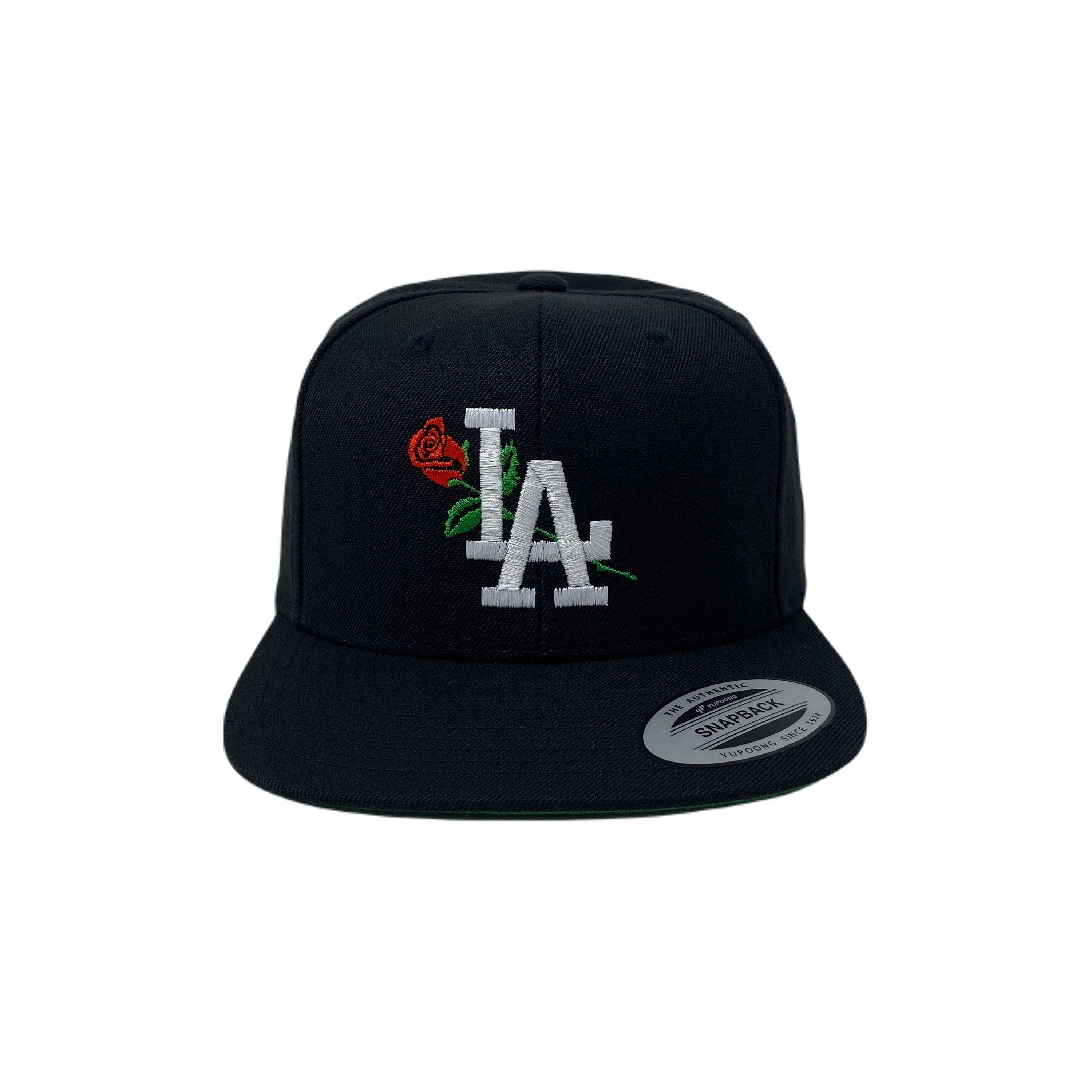 la hat with roses