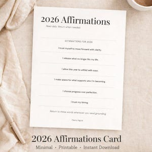 May include: A white 2026 Affirmations card with black text. The card includes affirmations such as "I trust myself to move forward with clarity" and "I choose progress over perfection." The card is labeled "2026 Affirmations Card" and is described as minimal, printable, and an instant download.