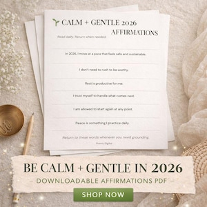 May include: A stack of white paper with the text "CALM + GENTLE 2026 AFFIRMATIONS" in green and black. The text includes affirmations such as "I don't need to rush to be worthy." A banner at the bottom reads "BE CALM + GENTLE IN 2026 DOWNLOADABLE AFFIRMATIONS PDF SHOP NOW."