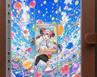 May include: A brown leather-bound binder containing a clear plastic trading card sleeve. Inside the sleeve is a Rosa's Encouragement Pokémon trainer card featuring a character with brown hair and a pink hat, surrounded by colorful balloons.
