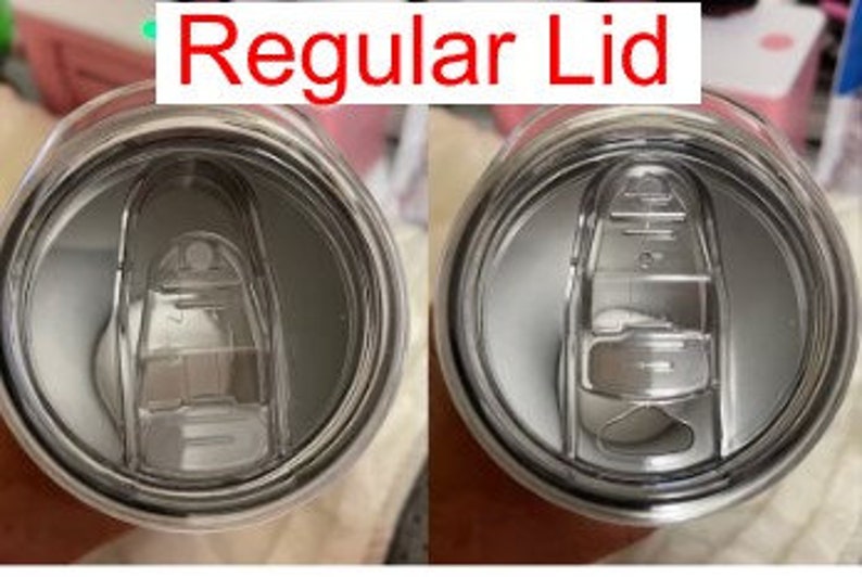 May include: Close-up of a stainless steel tumbler lid with a small hole for sipping. The lid is silver and has a smooth, shiny finish.