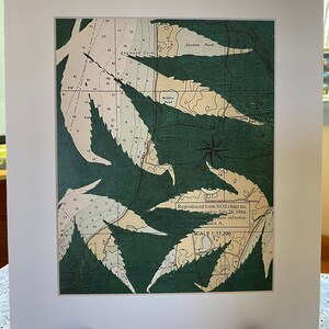 May include: A green and white print of a nautical map with the text "Reproduced from NOS chart no. ... rensrected to July 28, 1984. For additional update informa- tion see appandix A. SCALE 1:17,200"