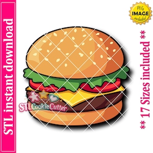 May include: A digital illustration of a cheeseburger featuring a sesame seed bun, green lettuce, red tomato slices, a yellow slice of cheese, and a brown meat patty. The graphic includes text stating STL instant download and 17 sizes included.