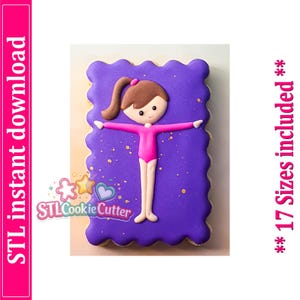 May include: A rectangular biscuit with scalloped edges, decorated with purple icing and gold speckles. A figure with brown hair in a ponytail and a pink leotard is centred on the biscuit. Text on the image reads STL instant download and 17 Sizes included.