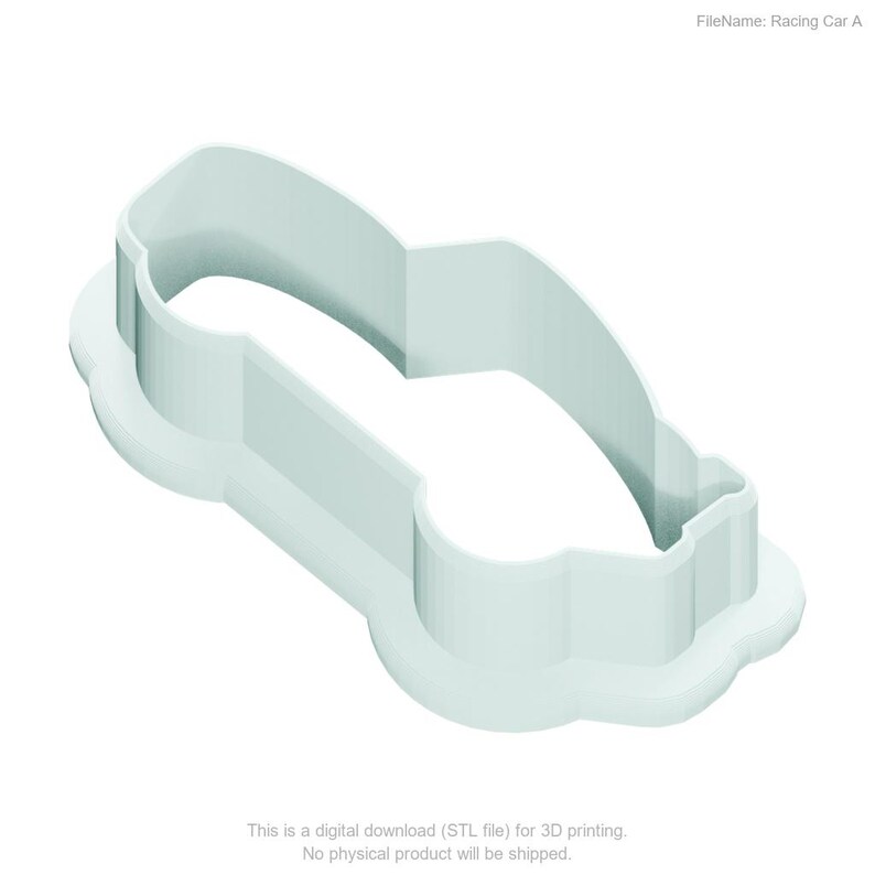 May include: A pale mint green cookie cutter shaped like a racing car. The object features a raised, thin-walled outline that forms the silhouette of a vehicle, set upon a flat, wider base plate that follows the same contour of the car shape.
