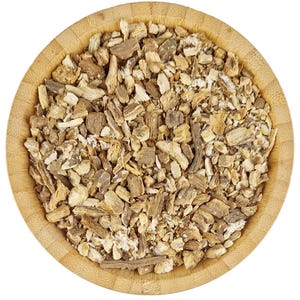 May include: A close-up view of a wooden bowl filled with dried, light brown, and beige root pieces. The root pieces are irregularly shaped and have a rough texture.