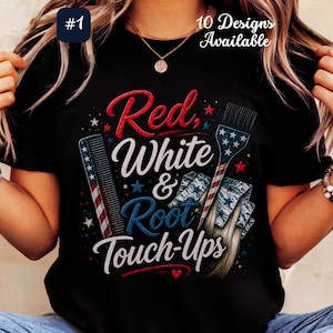 May include: Black t-shirt with a patriotic design featuring the words "Red, White & Root Touch-Ups" in red, white, and blue. The design includes a comb, a brush, and stars. The text "10 Designs Available" is also present.
