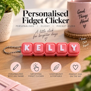 May include: A pink rectangular fidget clicker featuring five square buttons with white letters spelling KELLY. The device includes a silver metal ball chain attached to one side. Text on the image reads Personalised Fidget Clicker and A little click for brighter days.