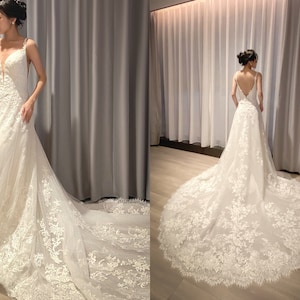 Klassieke ivoorkanten trouwjurk, open achterkant, prachtige bloemendetails, bruidsjurk, receptiejurk