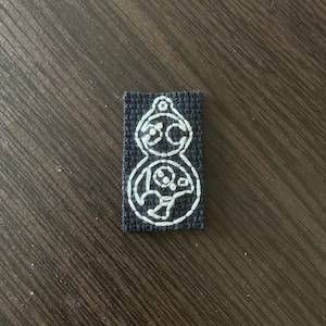 Gallifreyan "Bad Wolf" parche de hierro