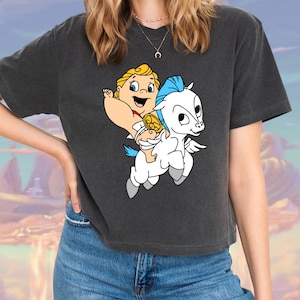 May include: A dark gray cropped t-shirt with a cartoon image of a baby Hercules riding Pegasus, a winged white horse.