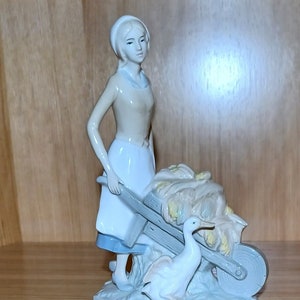 Lady with Wagon Figurine