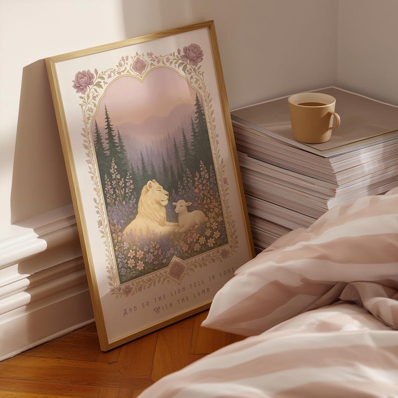 May include: Framed art print featuring a lion and lamb in a forest scene. The artwork has a gold frame and includes the text "And so the lion fell in love with the lamb." The color palette includes soft pinks, greens, and purples.