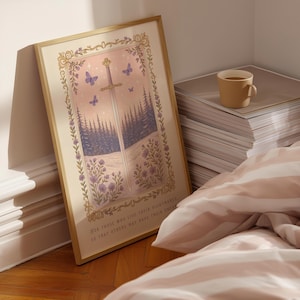 May include: A framed art print featuring a sword, butterflies, and a forest scene. The artwork has a gold frame and includes the text "For those who live their nightmares so that others may have their dreams."