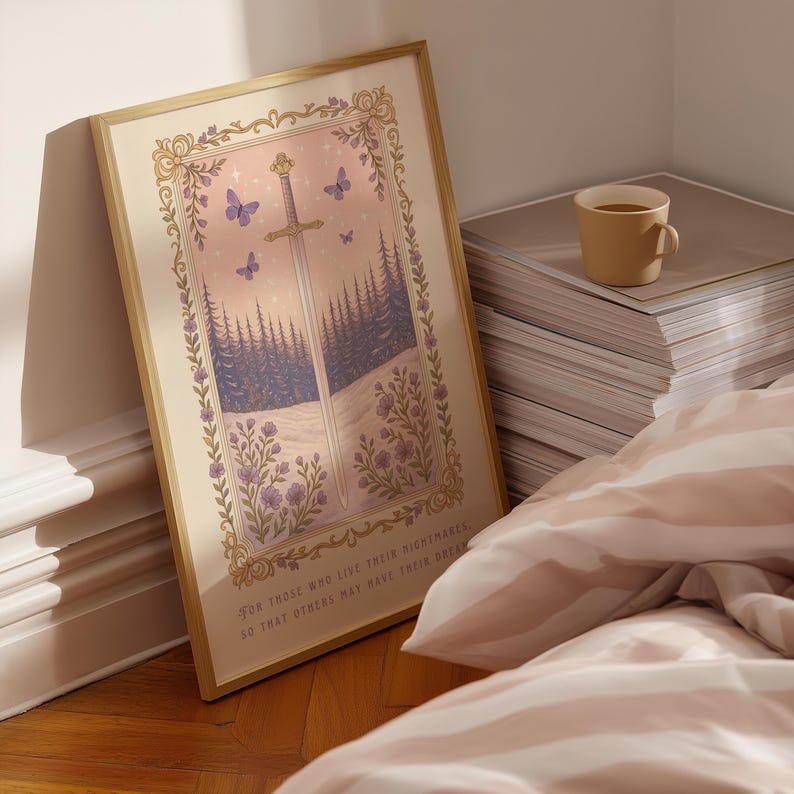 May include: A framed art print featuring a sword, butterflies, and a forest scene. The artwork has a gold frame and includes the text "For those who live their nightmares so that others may have their dreams."