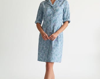 Robe fleurie en coton, manches courtes boutonnée avec poches