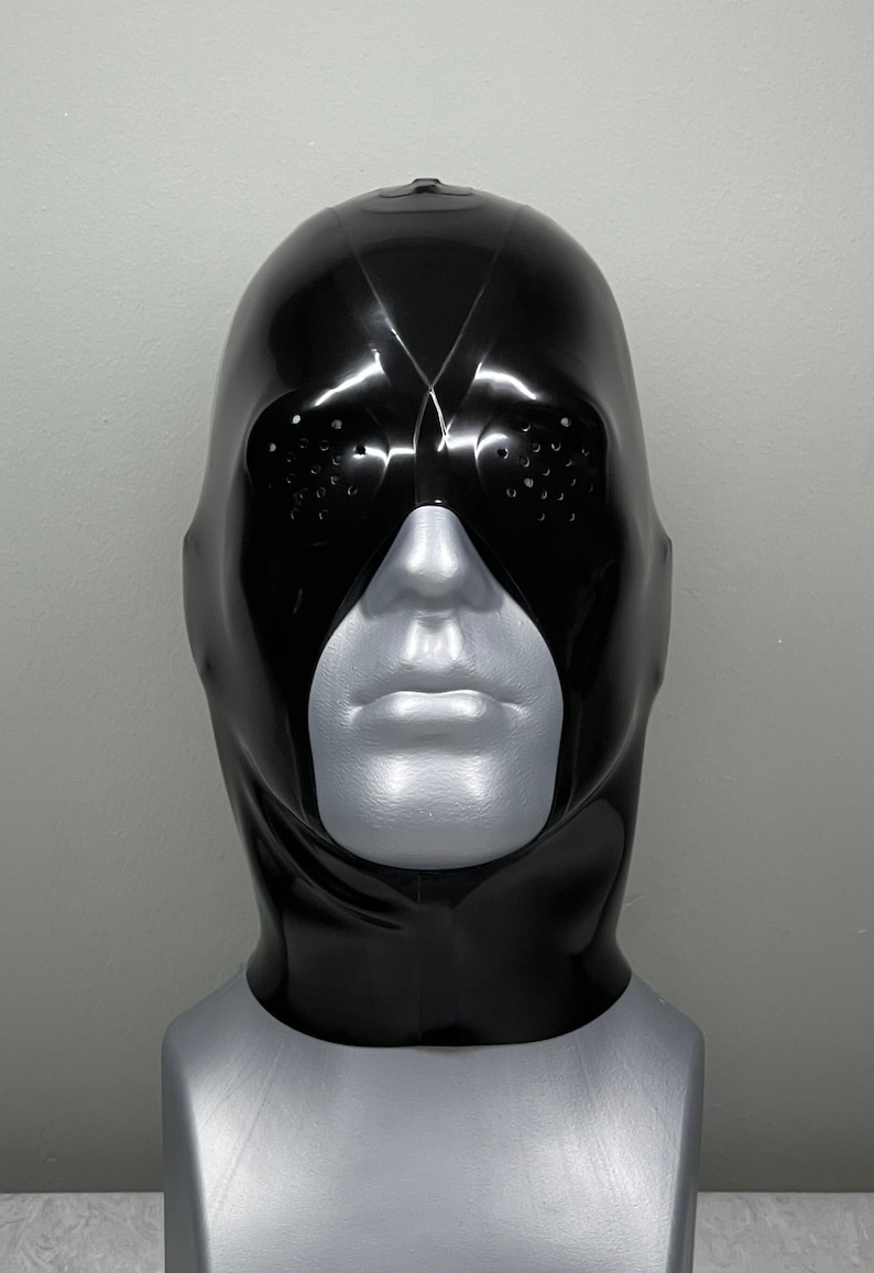 May include: A black latex mask with a visor and eye holes. The mask is on a gray mannequin head.