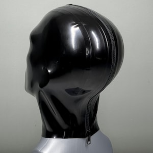 May include: A black latex hood with a zipper down the back.