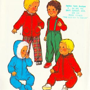 May include: A sewing pattern envelope labeled 2476 for 12-month-old babies weighing 8-9.45kg. The cover features illustrations of children wearing a red hooded jacket with plaid pants, green overalls with a red shirt, a blue hooded snowsuit, and a red jumpsuit.