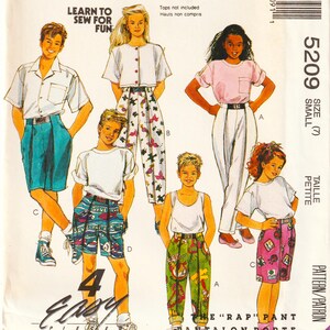 May include: McCall's sewing pattern featuring illustrations of various outfits, including pants and shorts. The pattern includes the text "Learn to Sew for Fun" and "The 'Rap' Pant". The pattern is size small, petite, and has 4 easy pieces.