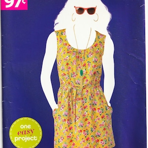 May include: Simplicity Sew Simple sewing pattern A1636. The pattern features a yellow floral print dress with a tie waist and pockets. The pattern size is U.S. 10-18. The image includes the text "one easy project".