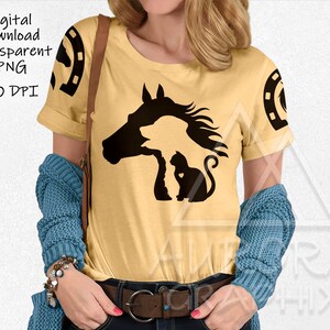 May include: A yellow t-shirt with a black silhouette of a horse, dog, and cat. The horse's head is in the foreground, with the dog and cat behind it. The t-shirt has a horseshoe design on the sleeve.
