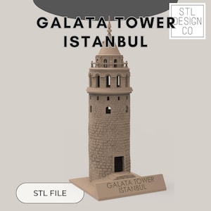 May include: A 3D printed model of the Galata Tower in Istanbul, Turkey. The model is made of a light brown plastic and is detailed with windows and a door. The base of the model has the words "Galata Tower Istanbul" printed on it.