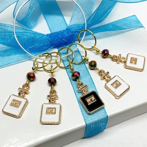 Stitch markers-Set of 5 perfume themed stitchmarkers-knitting notions-gift for knitter-knitters Xmas gift-progress keepers-
