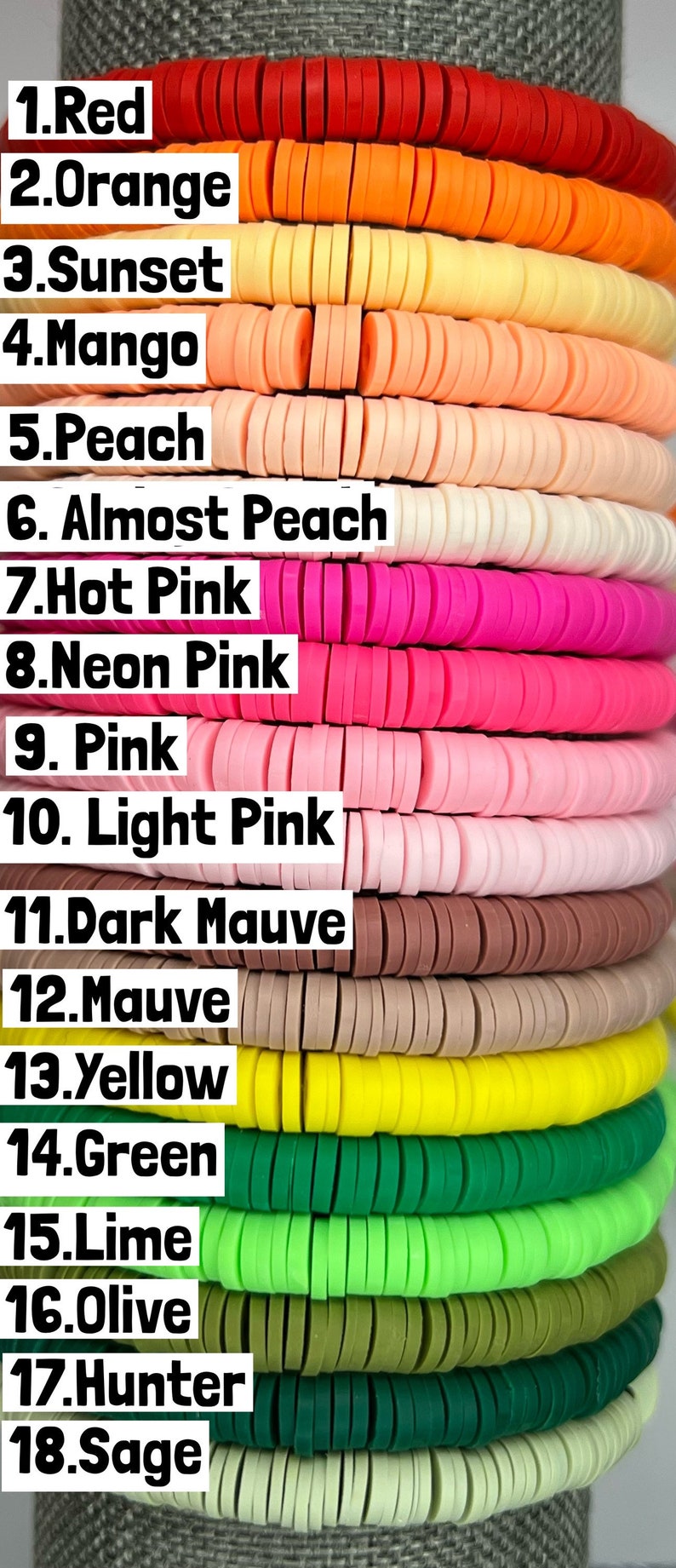 May include: A stack of 18 different coloured polymer clay beads, each with a number and name. The colours include red, orange, sunset, mango, peach, almost peach, hot pink, neon pink, pink, light pink, dark mauve, mauve, yellow, green, lime, olive, hunter, and sage.