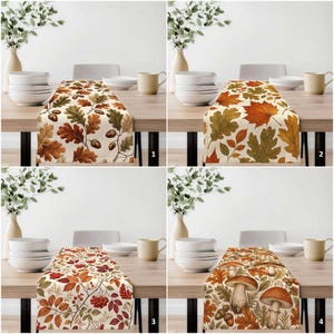May include: A collection of four table runners featuring autumn-themed patterns on a cream background. Design 1 shows oak leaves and acorns, design 2 displays maple leaves, design 3 features red berries and foliage, and design 4 depicts mushrooms.