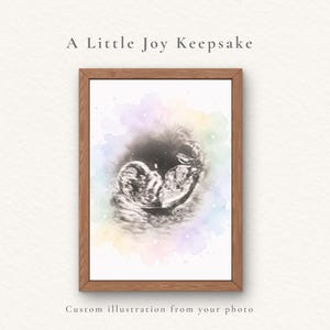 May include: A wooden-framed grayscale illustration of a foetus, with a watercolour wash of pastel hues. The text at the top reads "A Little Joy Keepsake" and at the bottom "Custom illustration from your photo."