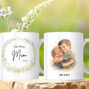 May include: A set of three ceramic mugs with a speckled, matte finish. The mugs are in shades of cream, light brown, and dark brown. Each mug has a simple, minimalist design and a rounded handle.