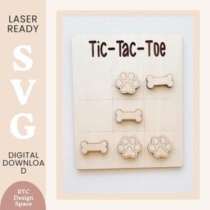 May include: Wooden Tic-Tac-Toe game board with paw print and bone game pieces. The words "Tic-Tac-Toe" are printed at the top. The words "LASER READY", "SVG", "DIGITAL DOWNLOAD" and "RTC Design Space" are printed on the left side.