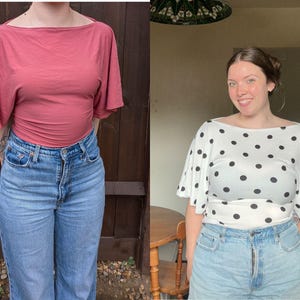 May include: Two short-sleeved tops with a wide boat neckline and flared sleeves. One top is solid dusty rose, and the other is white with a black polka dot pattern. Both tops are paired with light blue denim jeans featuring a classic five-pocket design.
