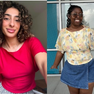 May include: A bright red short-sleeved top with a wide neckline and a yellow short-sleeved top featuring a multi-colored abstract pattern, paired with a dark blue denim wrap-style skirt. The tops have a relaxed fit with flutter sleeves.