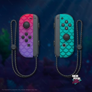 May include: Two Nintendo Switch Joy-Con controllers with custom skins. The left controller has a pink to purple ombre design with a mermaid scale pattern. The right controller has a teal mermaid scale pattern. Both controllers have black straps.