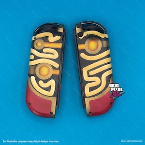 May include: A pair of black and gold Nintendo Switch Joy-Con controllers with a custom design featuring a maze pattern and red accents. The design is inspired by the Legend of Zelda video game series. The controllers are for sale on the Skin Pixel website.