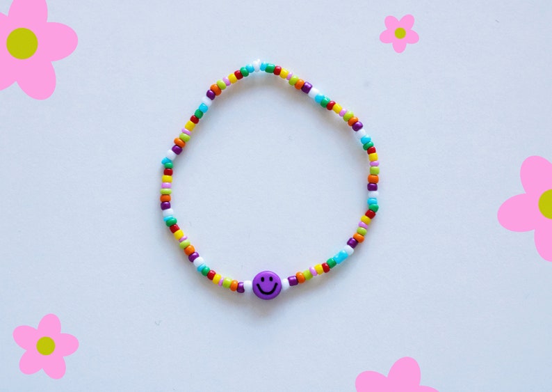 Bracelet de perles colorées avec smiley différentes variantes lila Smiley