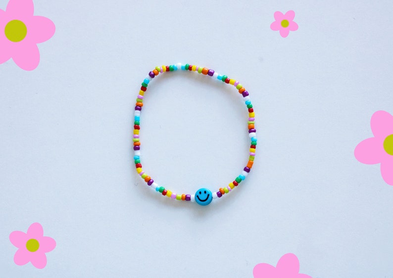 Bracelet de perles colorées avec smiley différentes variantes blauer Smiley