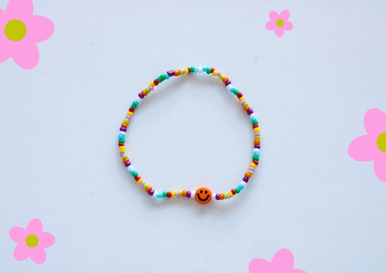 Bracelet de perles colorées avec smiley différentes variantes orangener Smiley