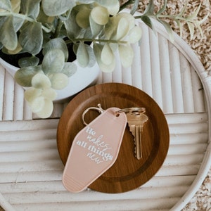 He Makes Things New Motel Keychain
