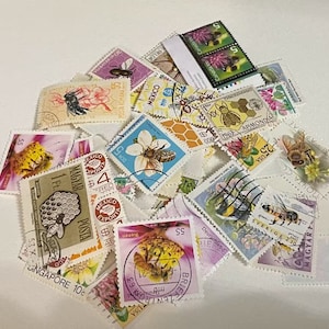 May include: A collection of vintage postage stamps featuring bees and honeycombs. The stamps are from various countries, including Mexico, Singapore, Sweden, and Hungary. The stamps are in various colors, including red, blue, green, yellow, and brown.